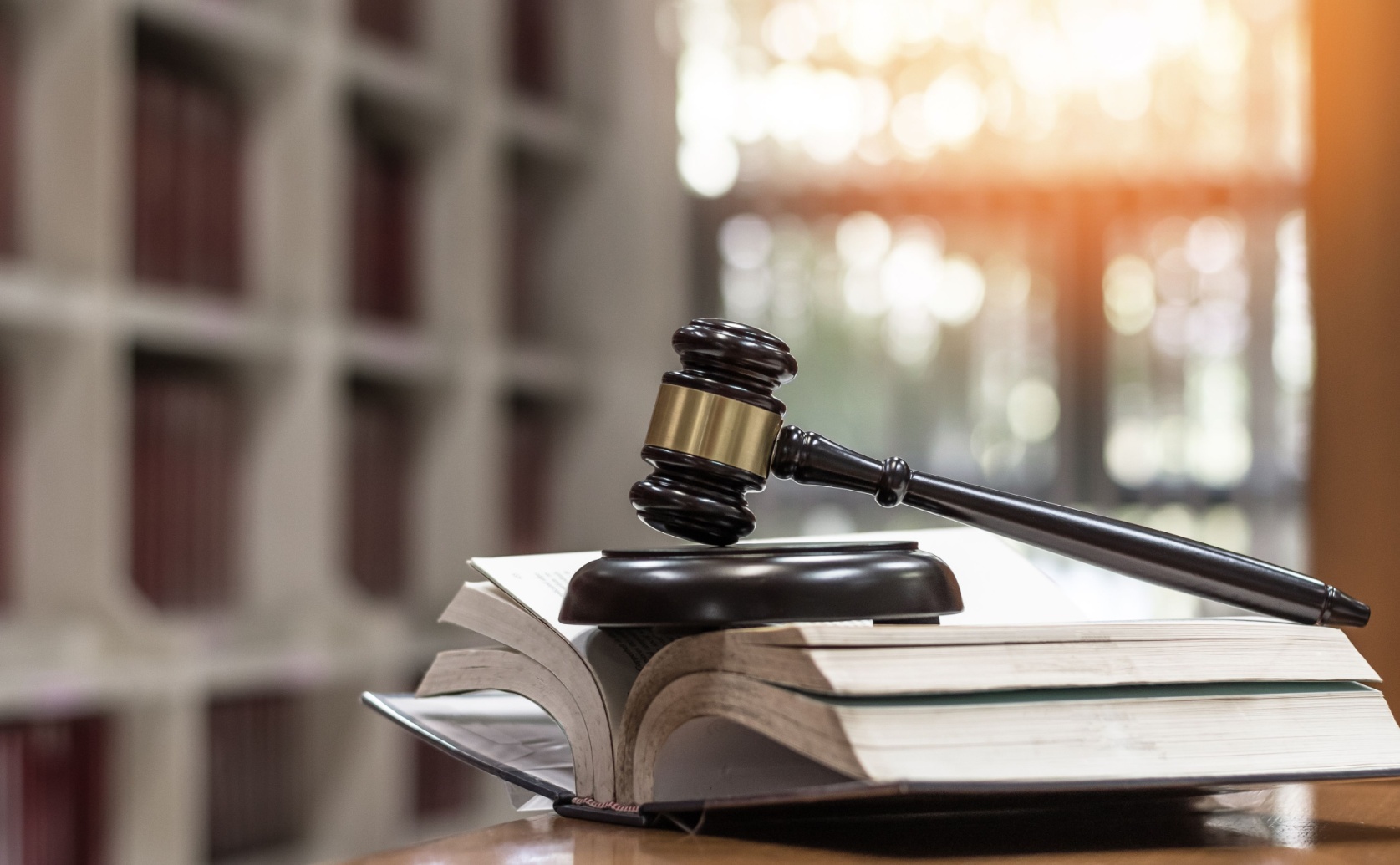 Judge's gavel resting on law books